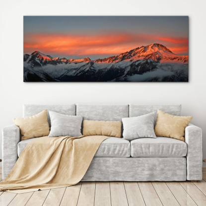 Quadro Montagne Catena Montuosa Innevata Al Tramonto Con Nuvole Arancioni Luminose mow28 quadro stampato su tela