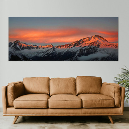 Quadro Montagne Catena Montuosa Innevata Al Tramonto Con Nuvole Arancioni Luminose mow28 quadro stampato su tela